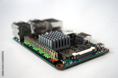 Small single-board computer with USB, Ethernet, HDMI, GPIO and radiator installed