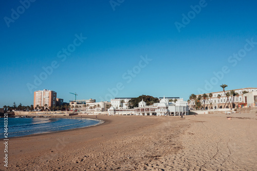 La Caleta beach with the spa, currently the headquarters of the Underwater Archeology Center of Andalusia. Cádiz, Spain. photo