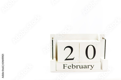 Wallpaper Mural the day of February on a white clear background. a wooden desktop calendar that reminds us of what date we are today. Torontodigital.ca