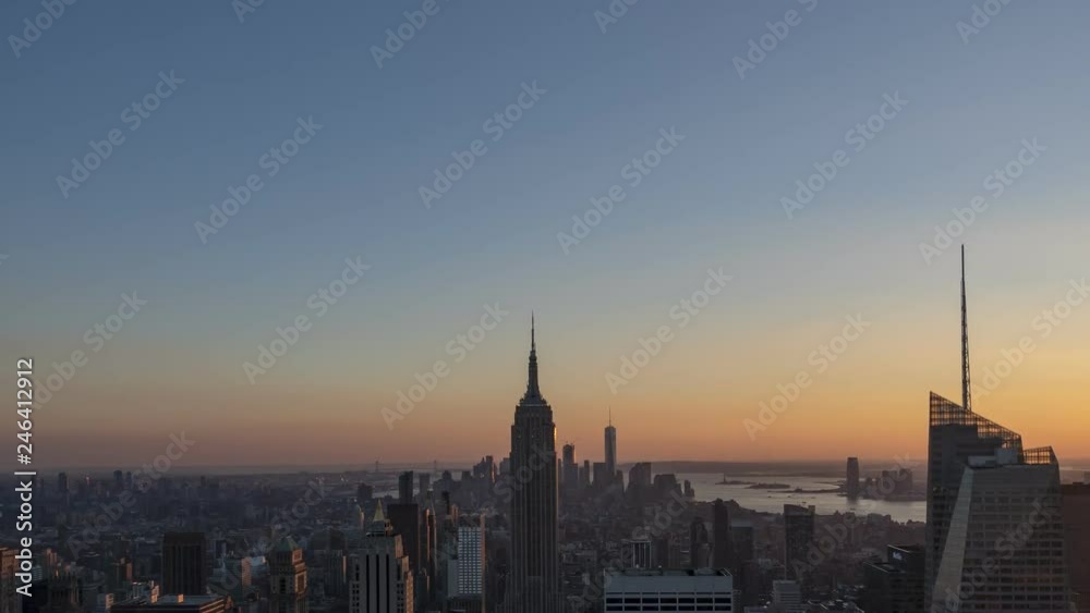 Time lapse video of New York Manhattan skyscrapers at dusk with zoom out Time lapse video of New York Manhattan skyscrapers at dusk with zoom out