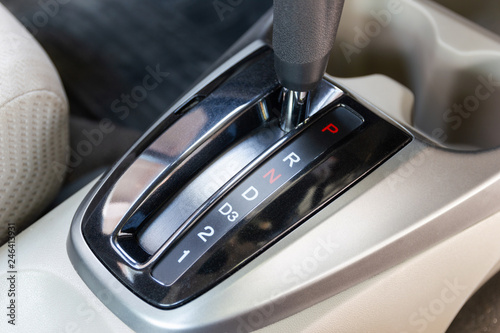 Close up the symbol of each auto gear for car shifting into P will try to engage the parking pawl to prevent the transmission