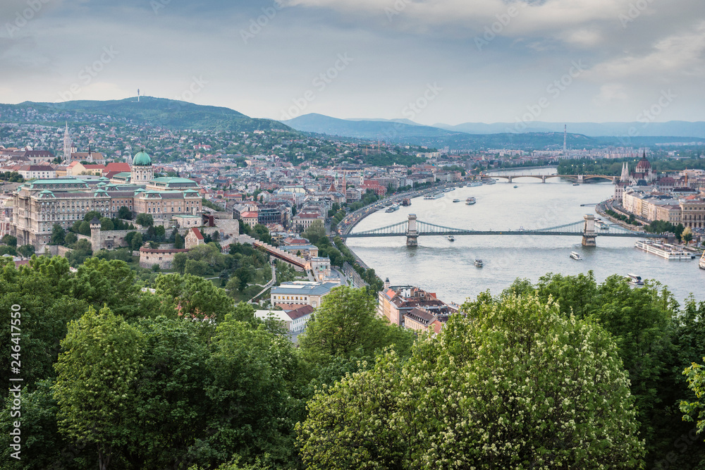 Budapest is the capital of Hungary.Beautiful big old town.The magnificent city is rich in history.The photo is made on a sunny day.City landscape with a wide large river.Beautiful buildings.Landscape.