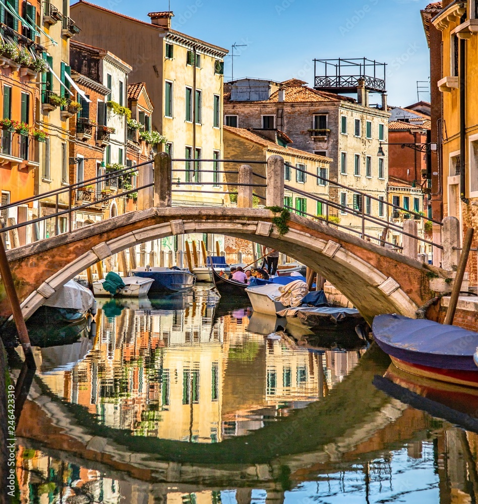 Italy beauty, typical  bridge over canal street in Venice, Venezia