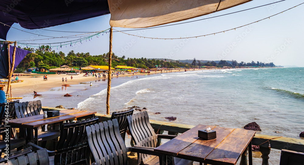 Sea View Restaurant Summer Pavilion Or Terrace Interior With Open beach view in Goa India with  Furniture baga beach. perfect view if beach side restaurants  - obrazy, fototapety, plakaty 
