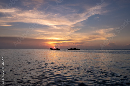 Ships in sunset