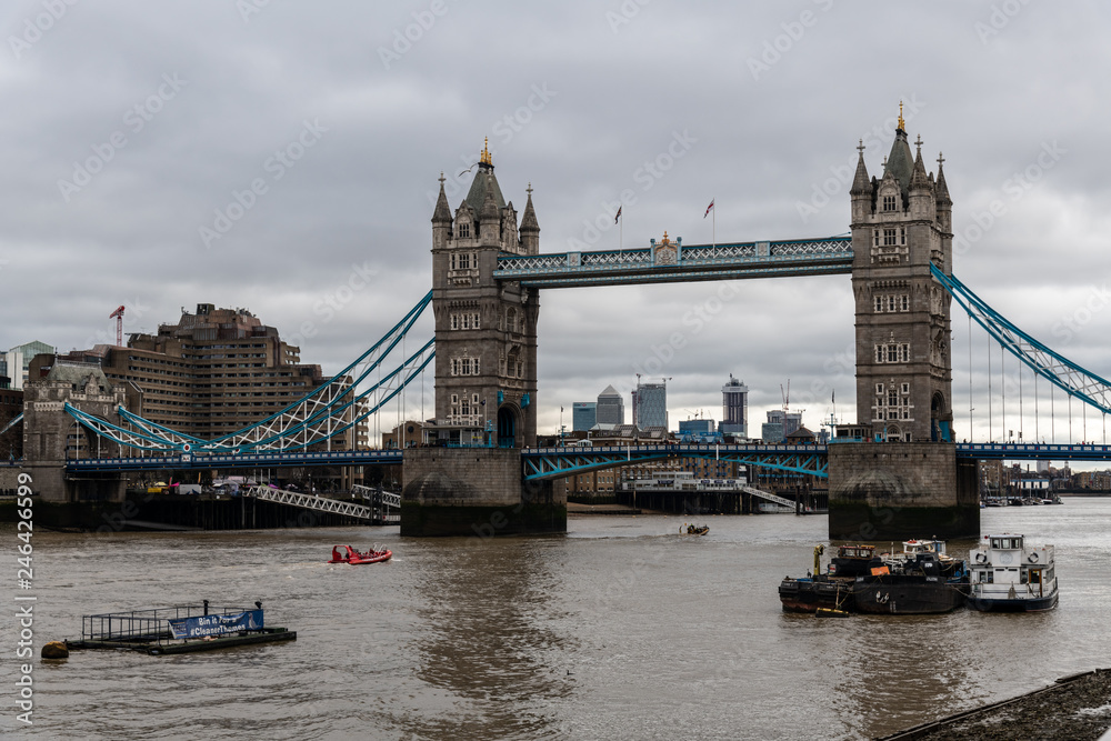 London Tower Bridge. The bridge is a combined bascule and suspension bridge in London built between 1886 and 1894