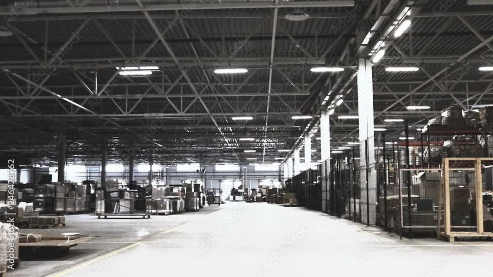 Typical storage space - warehouse with racks, pallets. Slow pan. Selective focus. Whitened by desgn. Typical storage space - warehouse with racks, pallets. Slow pan. Selective focus. Whitened by desgn.