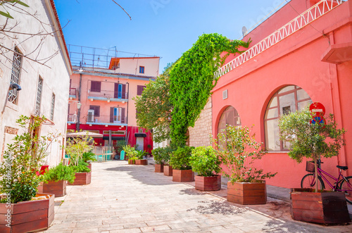 Fototapeta Naklejka Na Ścianę i Meble -  Traditional cozy greek street in city Nafplio, Greece