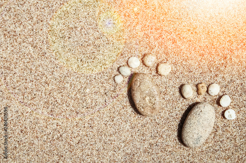 Beautiful footprints in the sand sea nature background
