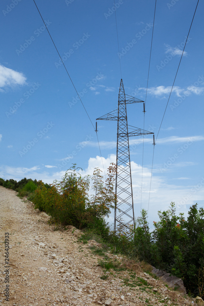 power line in the mountains near the road in Croatia