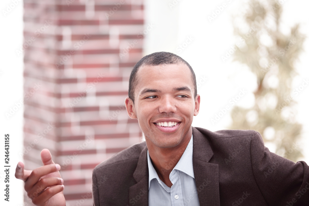 closeup .smiling businessman showing forward.photo with copy space closeup .smiling businessman showing forward.photo with copy space
