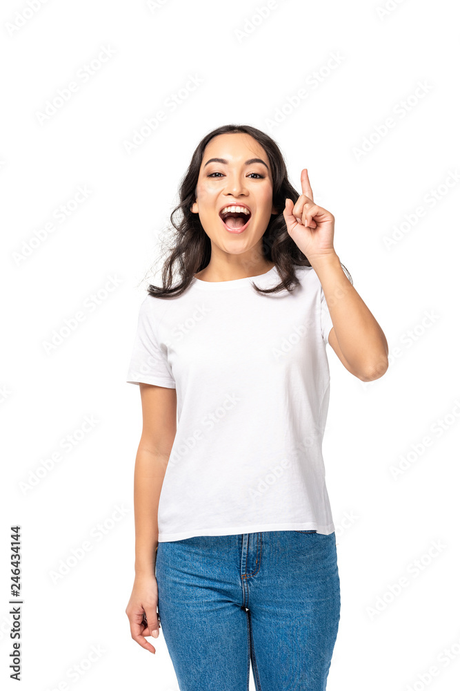 Excited asian woman showing idea gesture isolated on white Excited asian woman showing idea gesture isolated on white