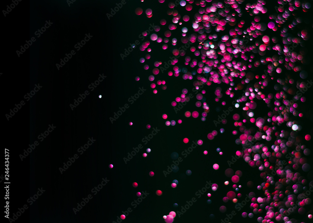 abstract bright colorful violet and red bokeh glitter sparkle blurred background. like molecule spread and absorb.