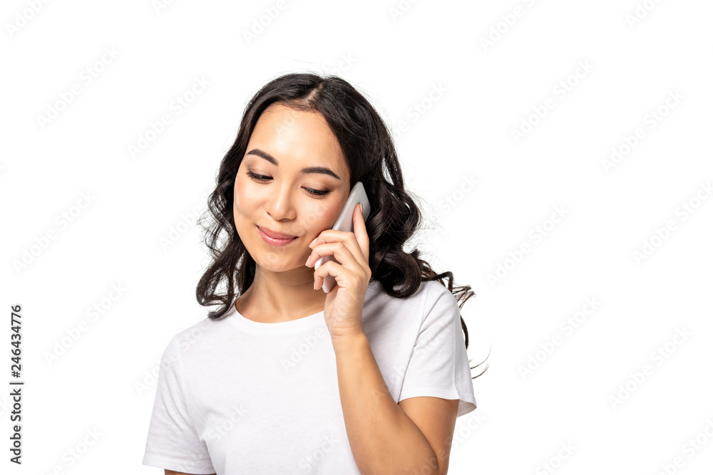 smiling asian girl with closed eyes talking on smartphone isolated on white smiling asian girl with closed eyes talking on smartphone isolated on white