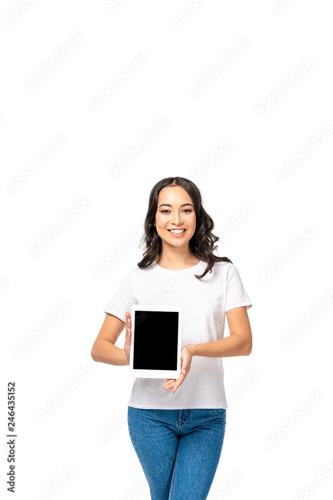 Smiling asian woman holding digital tablet with blank screen isolated on white Smiling asian woman holding digital tablet with blank screen isolated on white