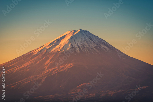 The peak of Mt. Fuji at sunrise in Fujikawaguchiko, Japan.