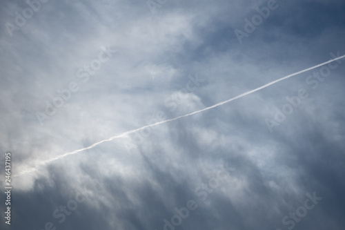 airplane in the sky - trace of plane