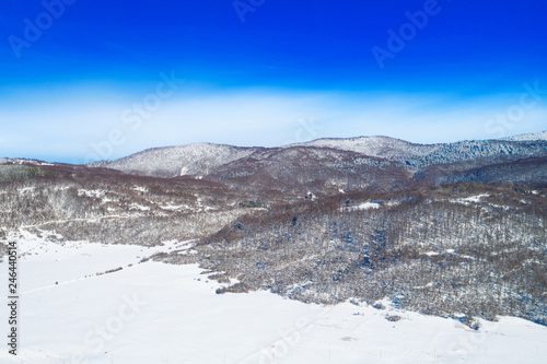 Croatian mountain nature landscape, beautiful winter panorama of woods under snow in Gorski kotar © ilijaa
