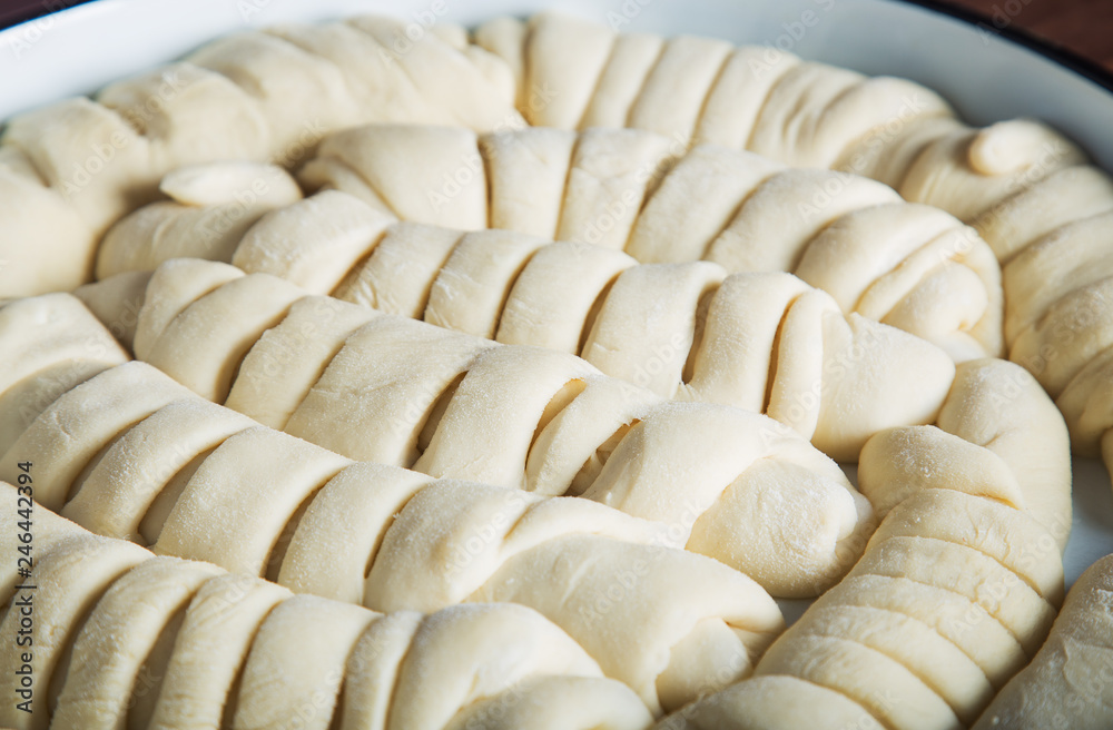 Fototapeta premium Close up of homemade unbaked croissants