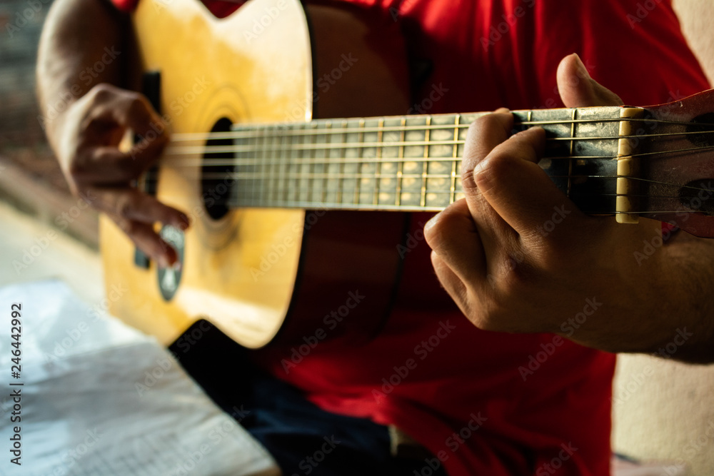 Fototapeta premium man playing guitar