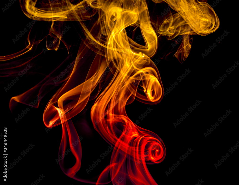 Obraz premium Colored smoke on black background