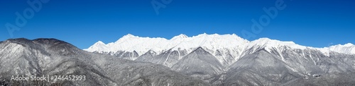 Panorama of winter Caucasus Mountains, Krasnaya Polyana, Russia.