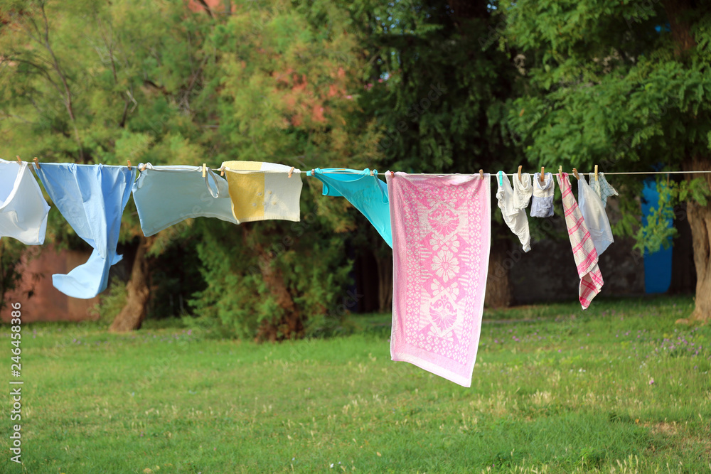 clothes hanging and dressed to dry outdoors on the clothesline