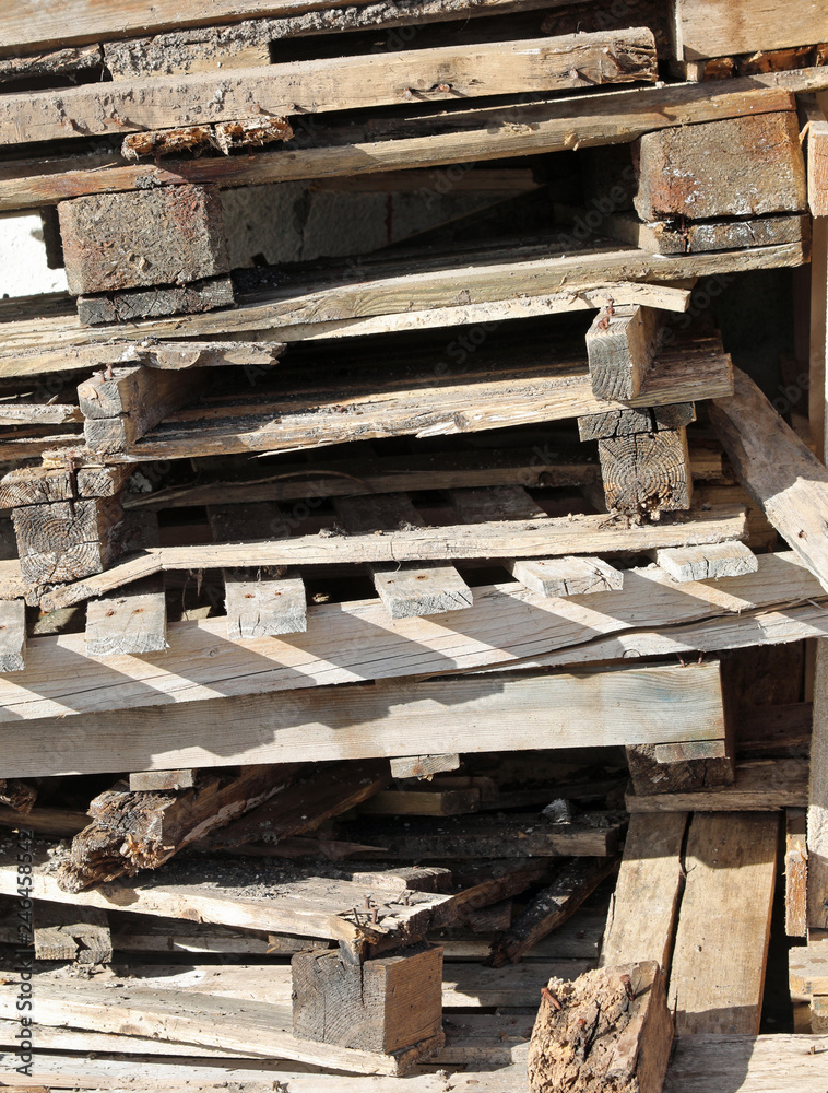 wooden boards of the old pallets used to transport the goods wooden boards of the old pallets used to transport the goods