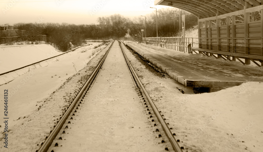 Railroad in winter under the snow. No train