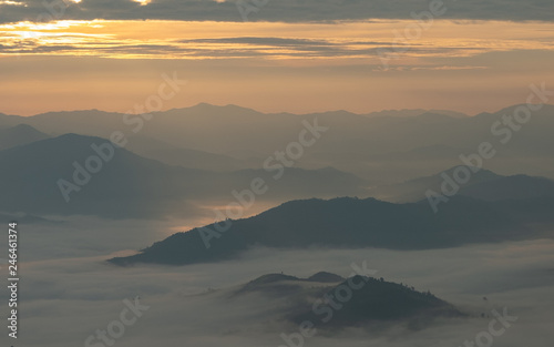 Fog, mountains, sunlight, beautiful mountain tops of the point of view. scenic beauty in the morning. Mae Moei, Tak in Thailand © Wuttichai