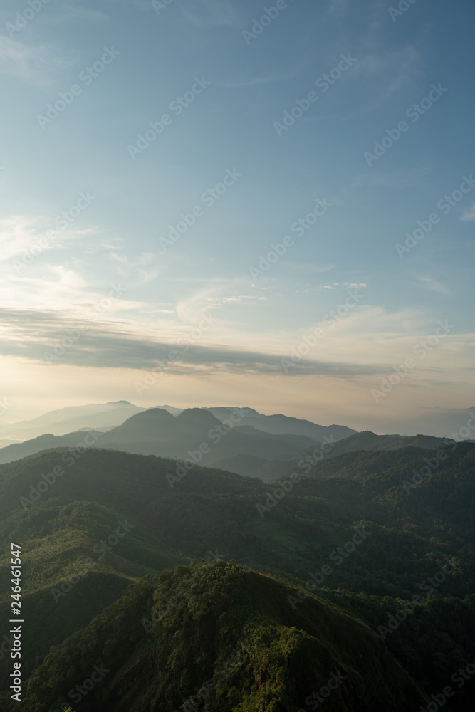 scenic mountain lined with alternates. The morning sun shines and fog covered the mountain. Doi KALHEPU, Mae Moei, Tak in Thailand