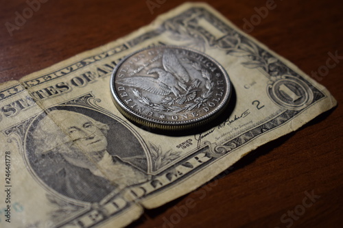 US dollar bill and coin