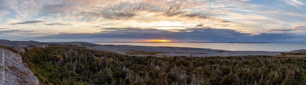 Scenic Canadian Landscape View on the Atlantic Ocean Coast during a cloudy sunset. Taken in Burnt Cape Ecological Reserve, Raleigh, Newfoundland, Canada. Scenic Canadian Landscape View on the Atlantic Ocean Coast during a cloudy sunset. Taken in Burnt Cape Ecological Reserve, Raleigh, Newfoundland, Canada.