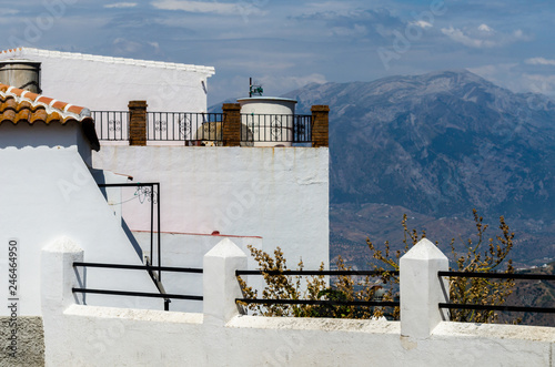 Typical white defensive walls in a small town of Andalusia, a historic element of architecture
