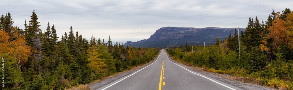Beautiful view of a scenic road during a cloudy day. Taken in Northern Newfoundland, Canada. Beautiful view of a scenic road during a cloudy day. Taken in Northern Newfoundland, Canada.