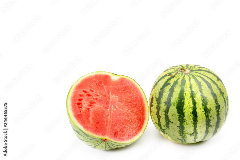 Ripe round watermelon and half berry isolated on white background. Free space for text. Ripe round watermelon and half berry isolated on white background. Free space for text.