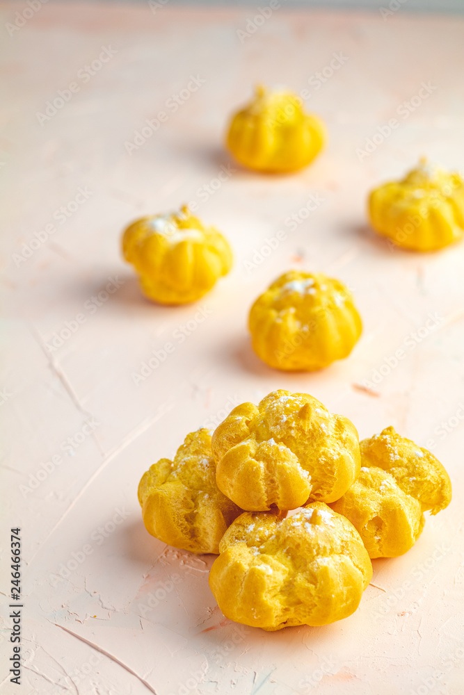 Delicious profiteroles with cream Delicious profiteroles with cream
