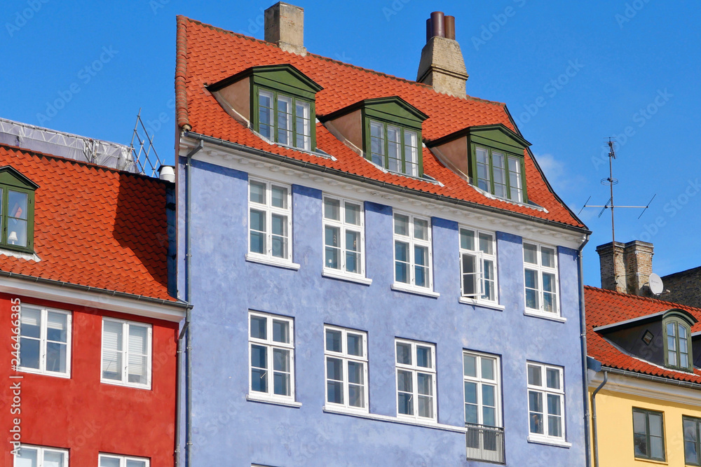 Copenhagen / Denmark - August 2016: colorful facade at Nyhavn at the old city centre