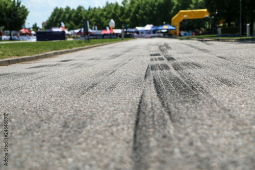 The rubber tracks from the rallye cars left on the tarmac in the hairpin. 