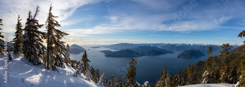 Beautiful Panoramic Canadian Landscape view during a colorful winter evening before sunset. Taken from top of Mnt Harvey, North of Vancouver, BC, Canada.