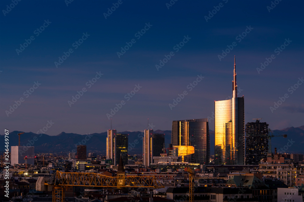 Milan skyline at evening with modern skyscrapers in Porta Nuova business district. Panoramic view of Milano city (Italy).