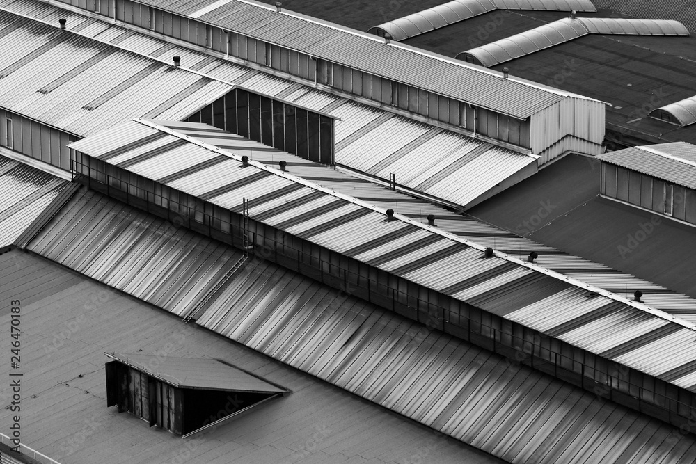 A detail of the old factory´s hall´s roofs. The industrial dirty area. A detail of the old factory´s hall´s roofs. The industrial dirty area.