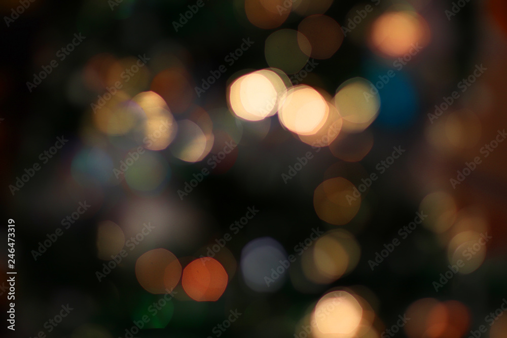 Bokeh abstract background. Colorful. Defocused. Blurred abstract bright lights. Holiday time. Evening Bokeh abstract background. Colorful. Defocused. Blurred abstract bright lights. Holiday time. Evening