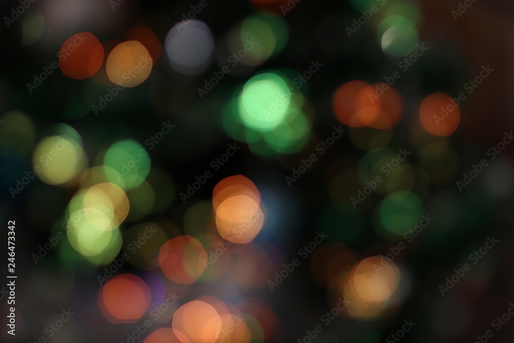 Bokeh abstract background. Colorful. Defocused. Blurred abstract bright lights. Holiday time. Evening