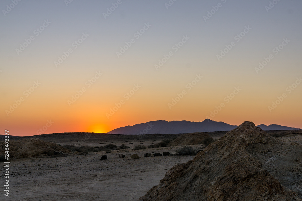 rugged desert mountain landscape sunset