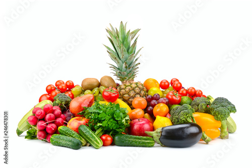 Large set fruits and vegetables with pineapple in center isolated on white