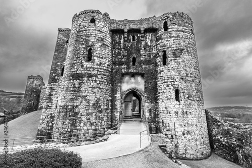 Kidwelly Normand Castle at Pembrokeshire Coast in Wales an amazing historical landscape of how the Normand protected its land from the invaders with its fortifications, castles and surrounding walls photo