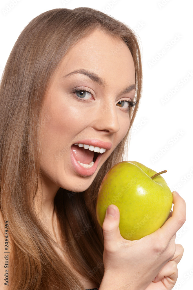 Portrait of beautiful young woman with green apple Portrait of beautiful young woman with green apple