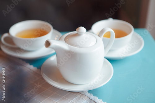 teapot with green tea for two people dinner