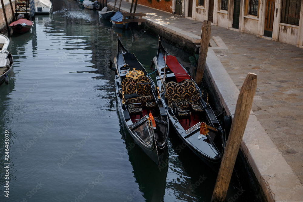 two gondolas in love on a canal in Venice